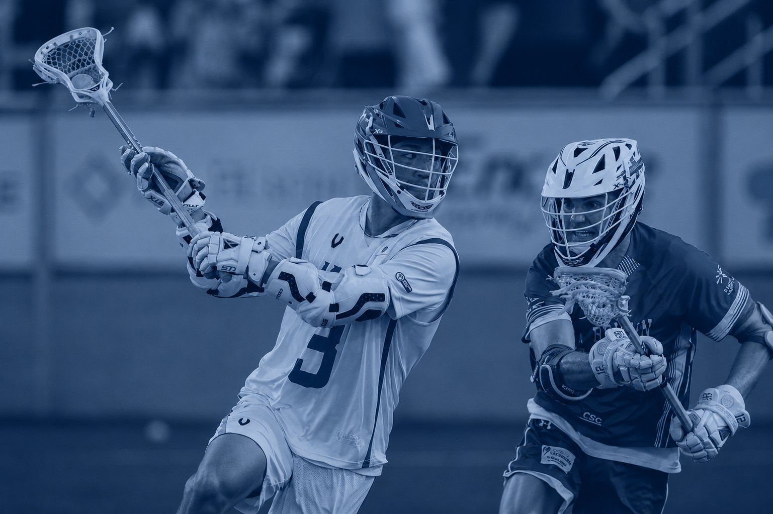 Lacrosse athletes competing while wearing the Prevent iMG
